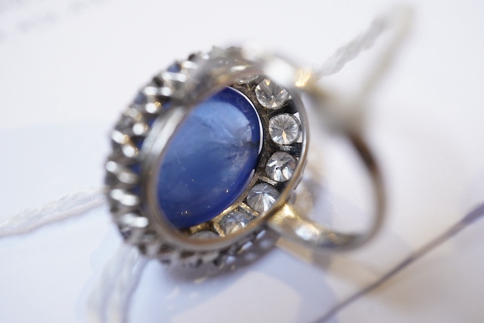 A sapphire and diamond ring, mid 20th century